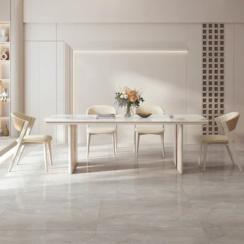 Минималистичный обеденный стол с кремовой ветровой каменной плитой во французском стиле, современный простой бытовой обеденный стол высокого класса, комбинация стульев